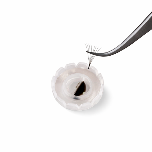 Adhesive cup with volume grooves